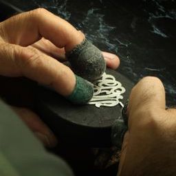 Moon and Lola production of hand-drawn hand-cut fine metals