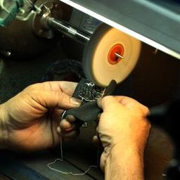 Moon and Lola production of hand-drawn hand-cut fine metals