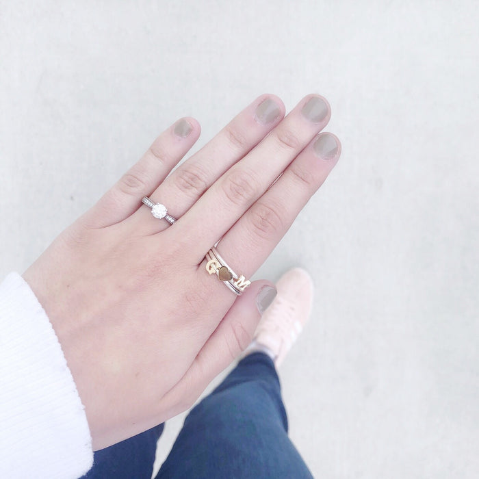 Moon and Lola - Victoria Letter Rings Stacked with Victoria Heart Ring